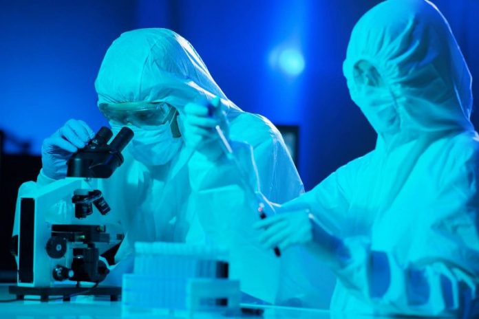 bigstock-Scientists-in-protection-suits-358566863_942286